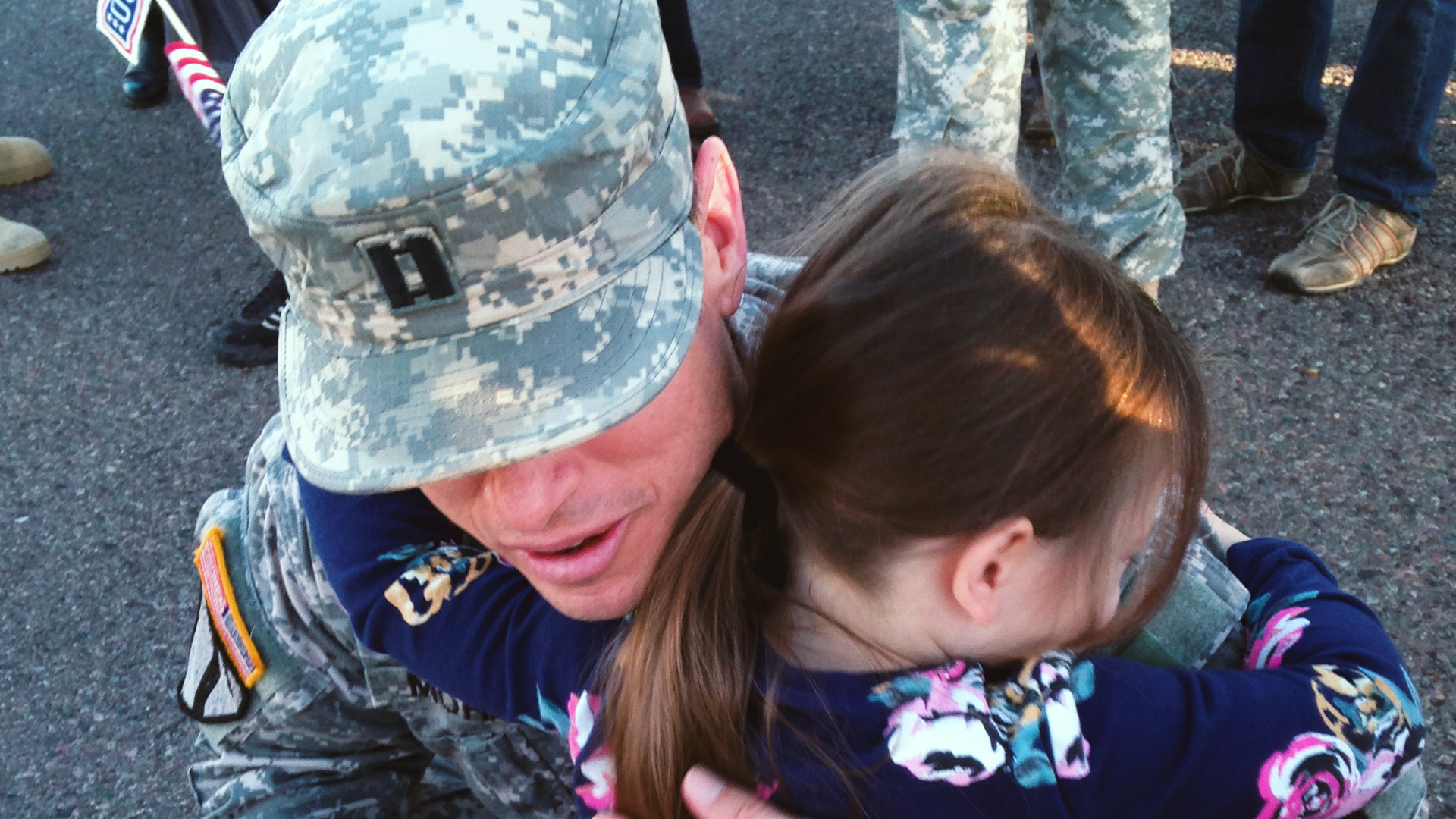 US Serviceman hugs daughter